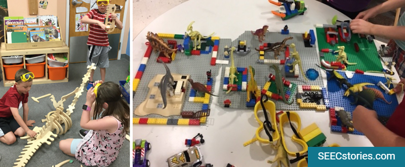 Children playing with legos and toy dinosaurs